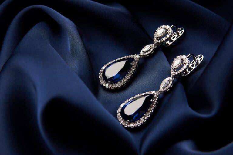 Sapphire earrings on a fabric