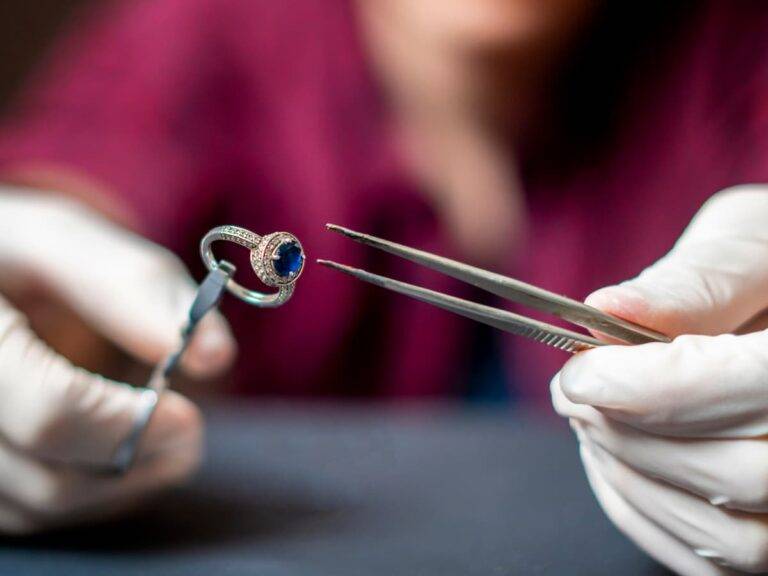 Jeweller inspecting ring